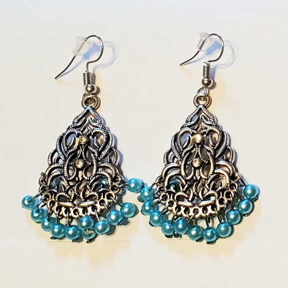 Paparazzi light mint pearl beaded silver earrings.